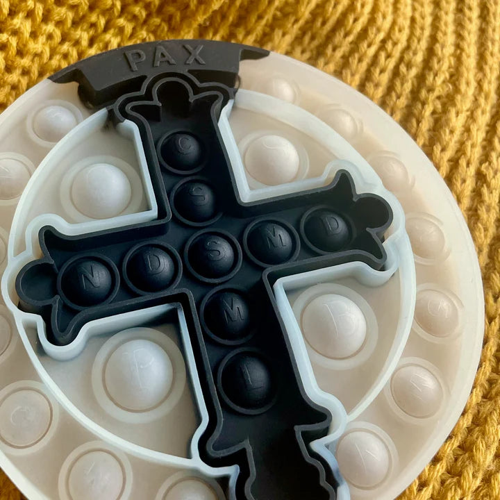 Glow-in-the-dark St Benedict Pop It